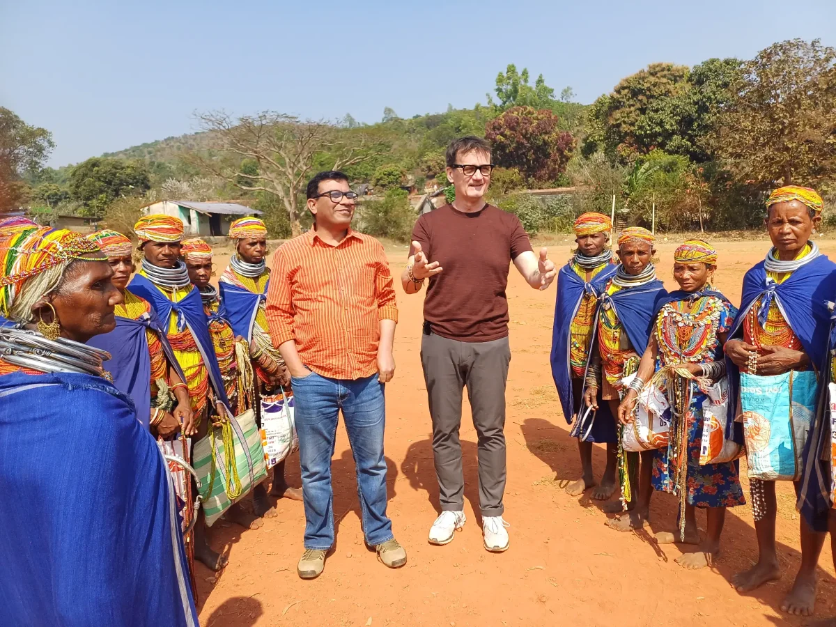 Dr. Syed Wali Khaled actively engaging with tribal community - Cultural immersion in action